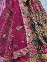 Wonderful Rani Pink Embroidered Velvet Bridal Wear Lehenga Choli