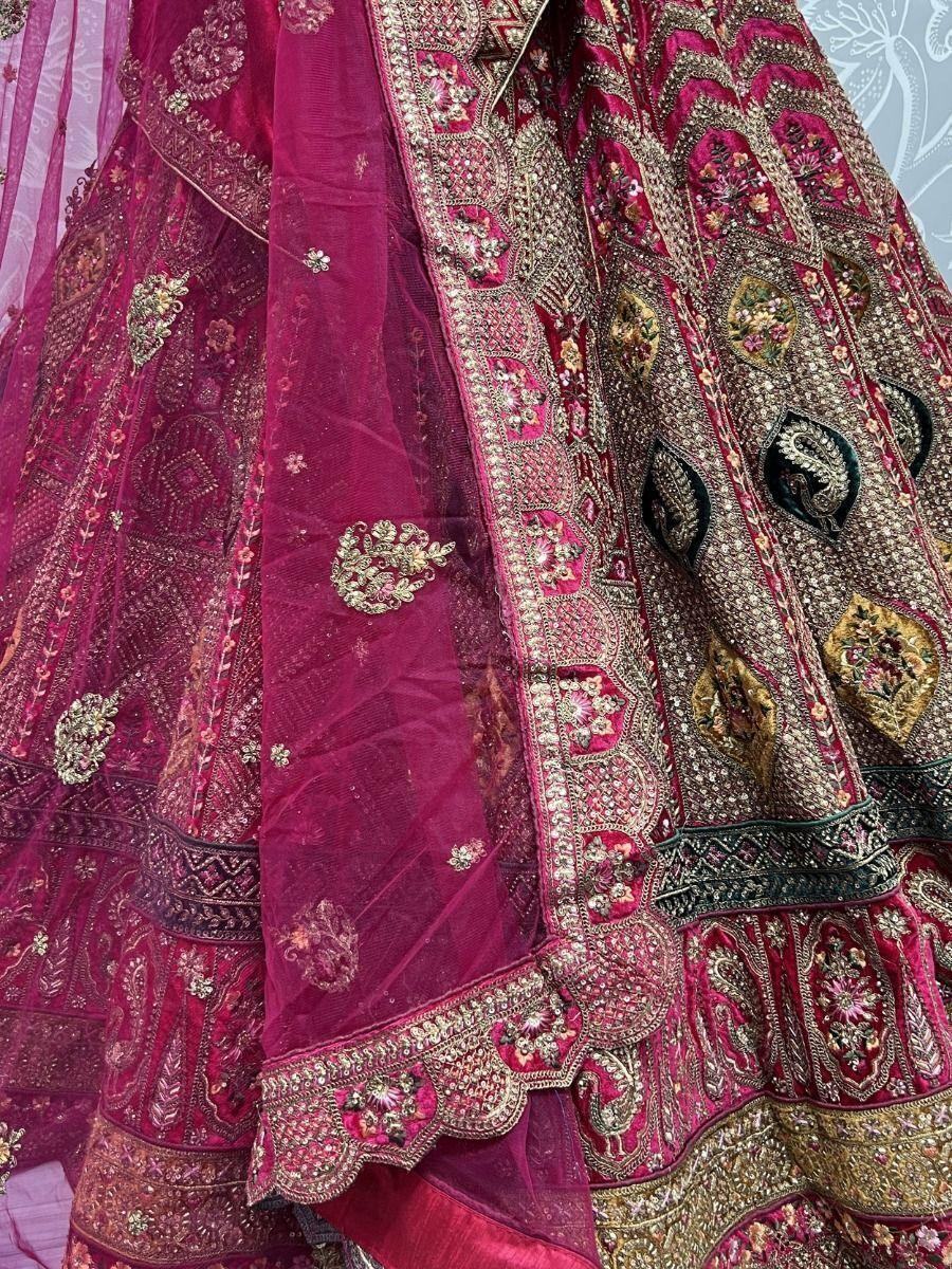 Wonderful Rani Pink Embroidered Velvet Bridal Wear Lehenga Choli