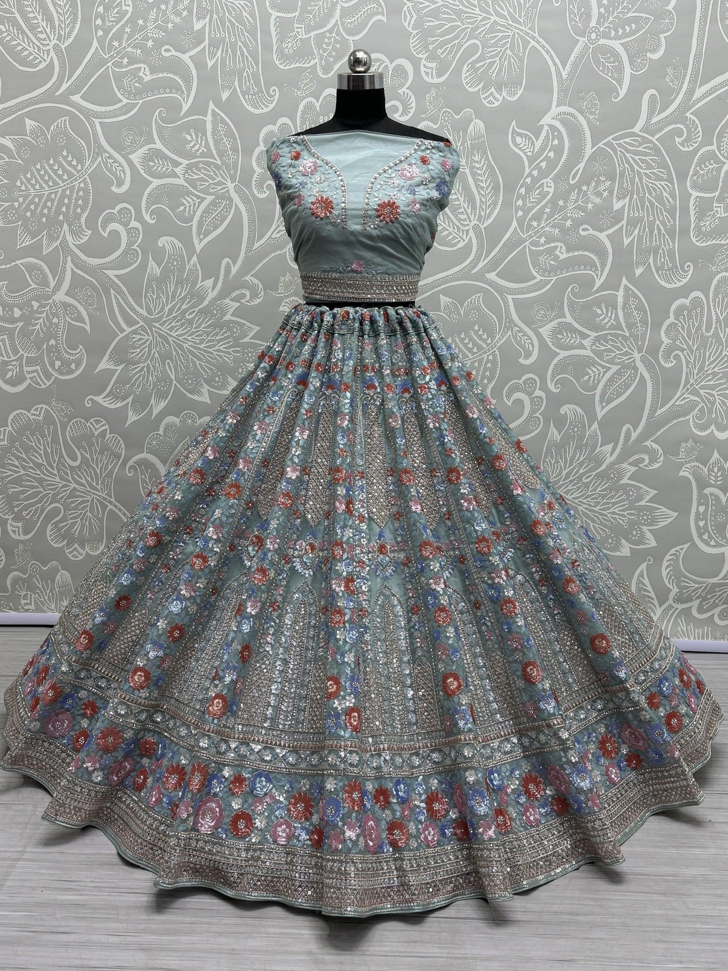 Wonderful Sky-Blue Sequins Net Bridesmaid Lehenga Choli With Dupatta