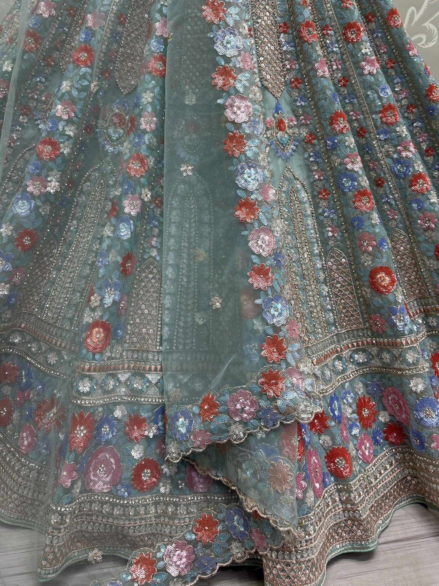 Wonderful Sky-Blue Sequins Net Bridesmaid Lehenga Choli With Dupatta
