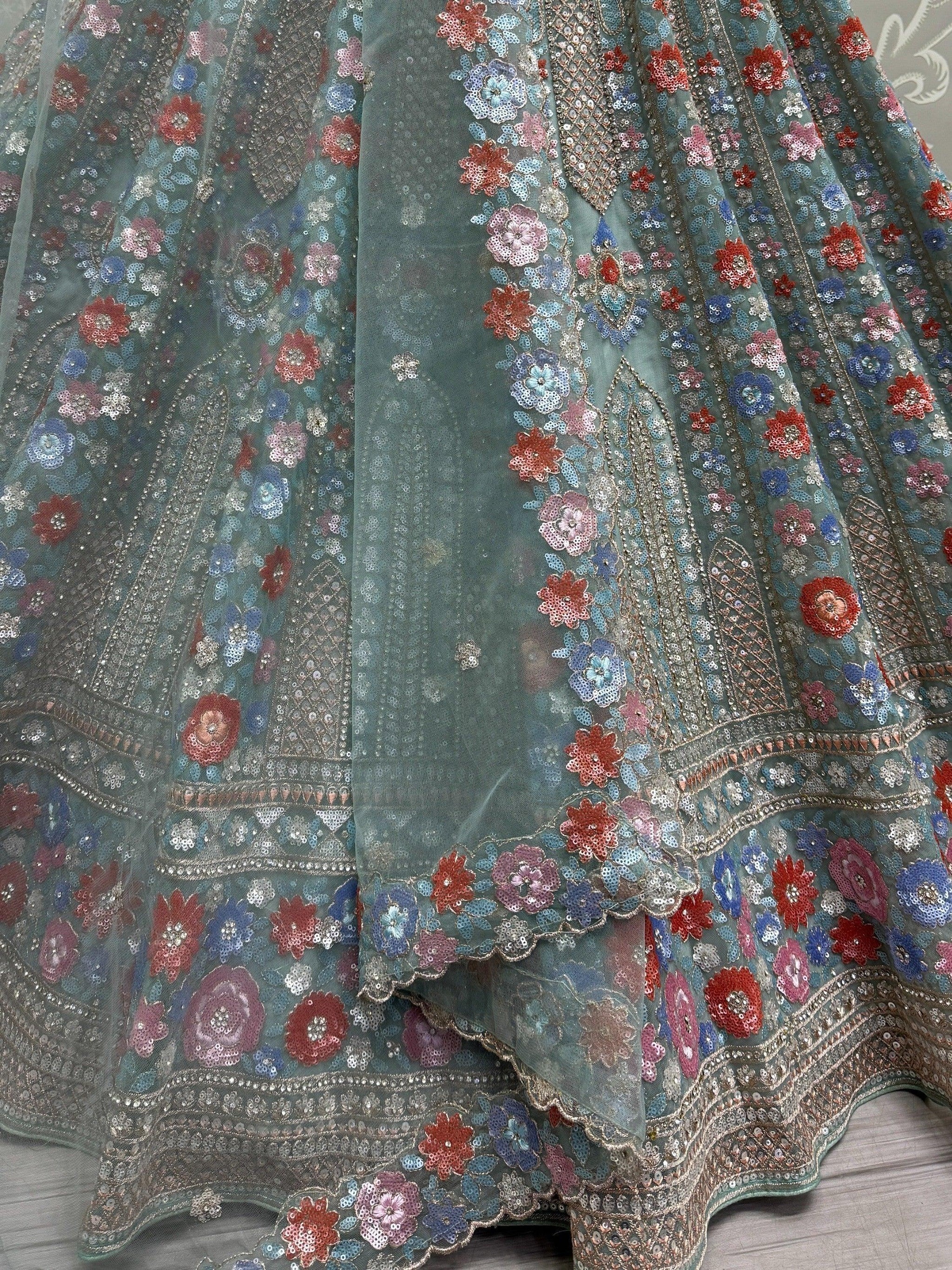 Wonderful Sky-Blue Sequins Net Bridesmaid Lehenga Choli With Dupatta