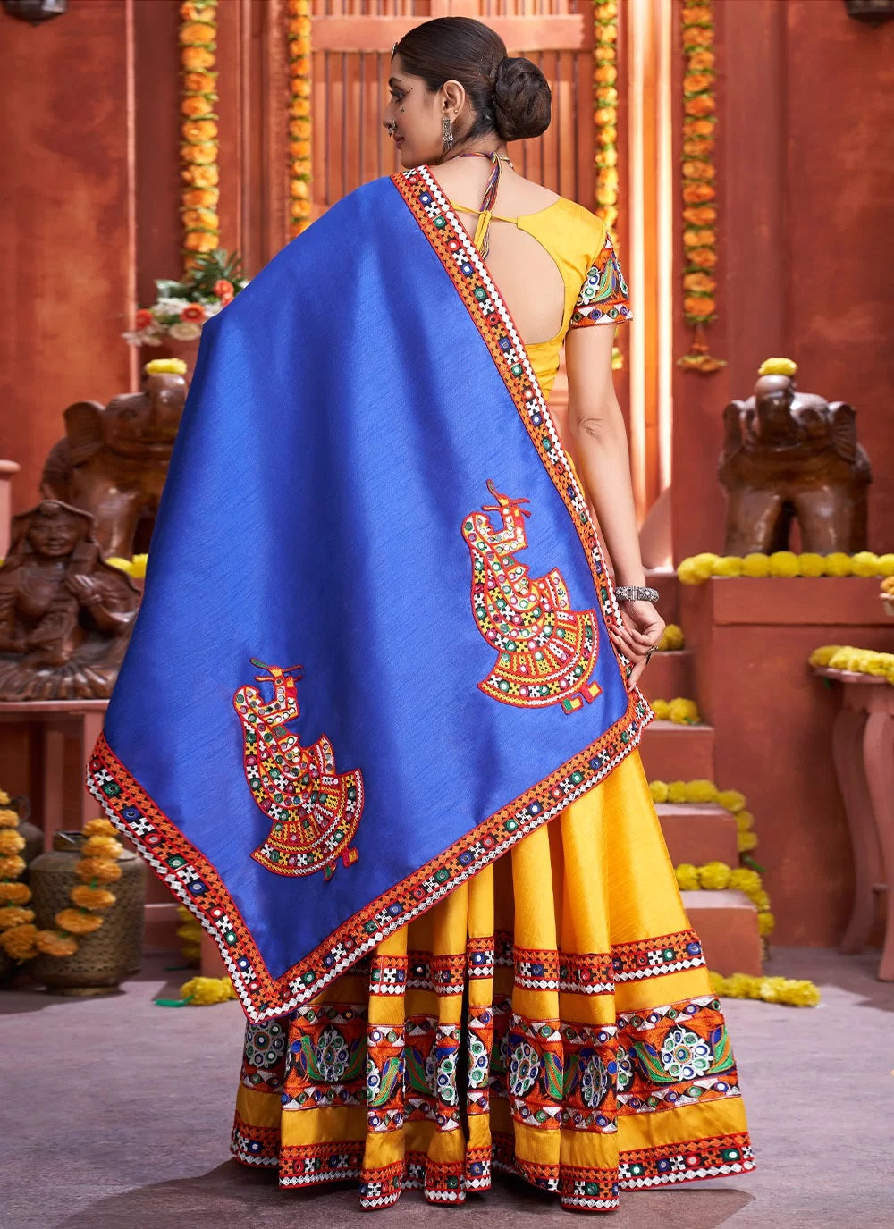 Yellow art silk adorable gamthi work navratri lehenga choli