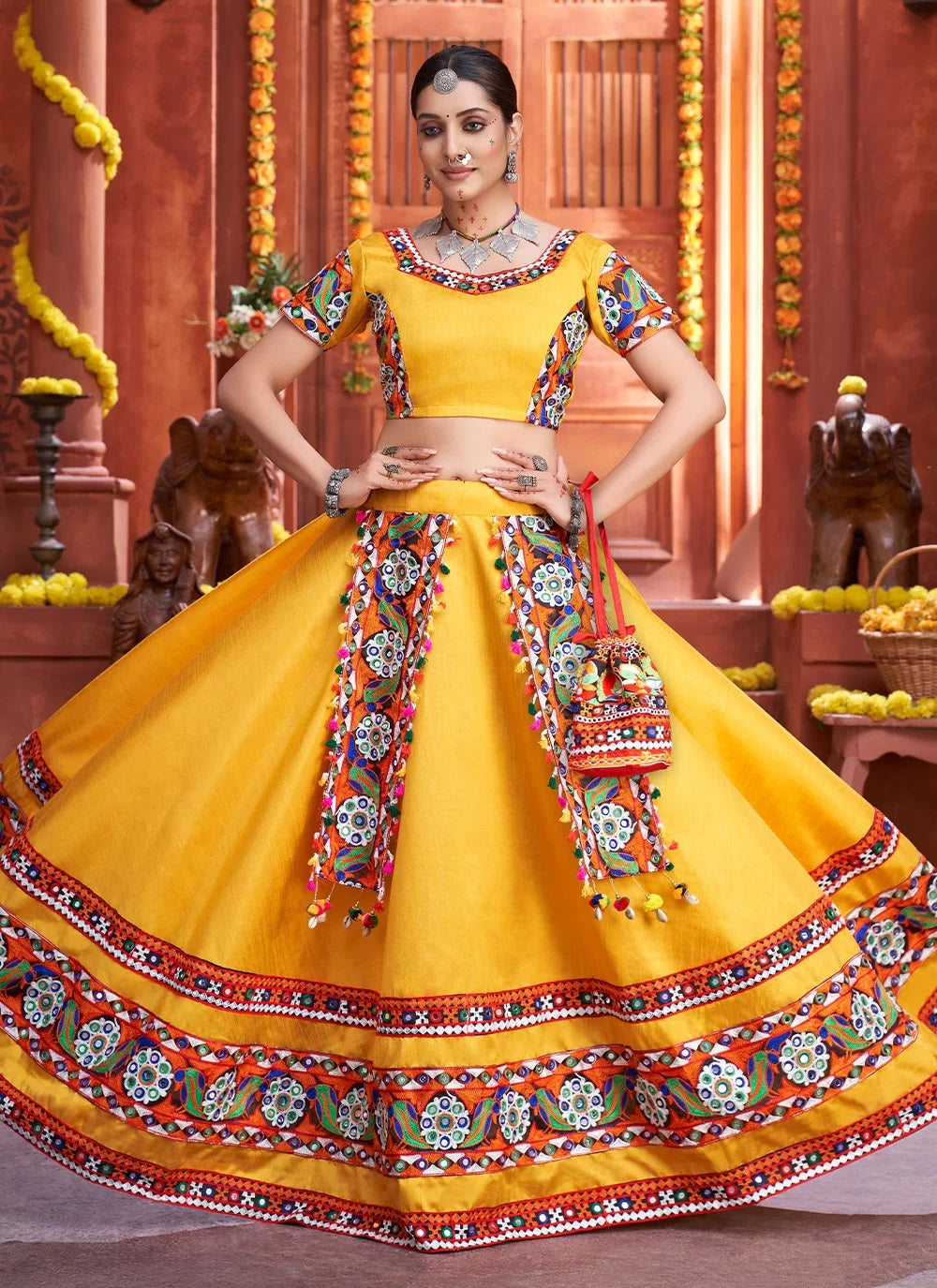 Yellow art silk adorable gamthi work navratri lehenga choli