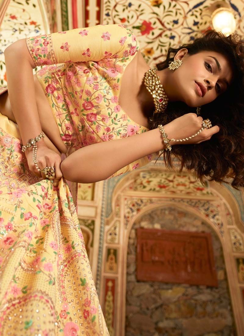 Yellow art silk stone work lehenga choli for reception