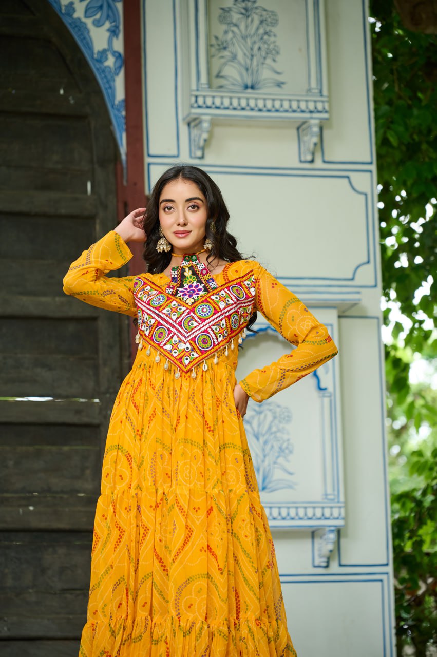 Yellow Bandhani Print Faux Georgette Gown with Kutchi Patchwork – Full Sleeves, 9 Meter Flair, Cotton Lining