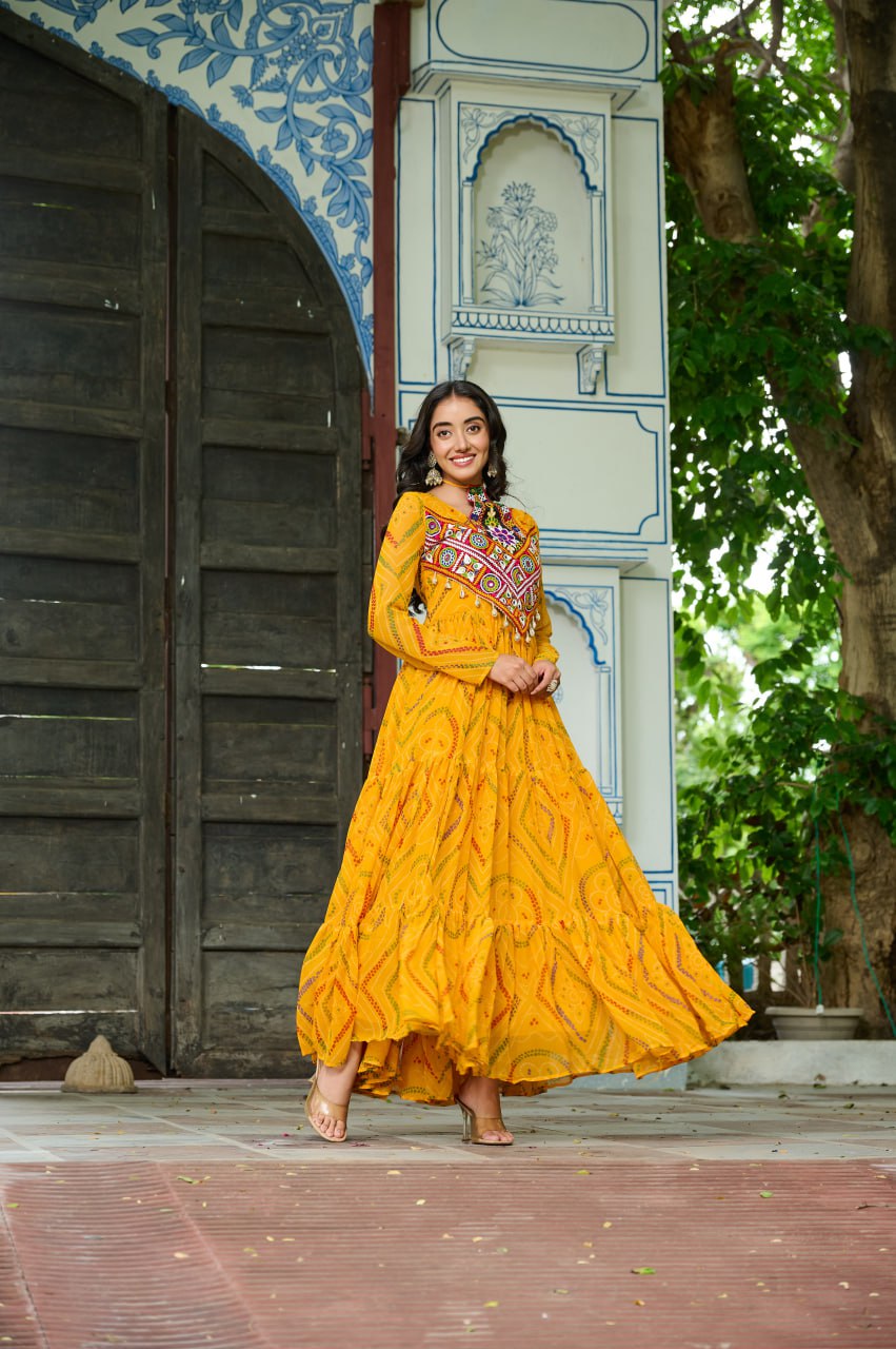 Yellow Bandhani Print Faux Georgette Gown with Kutchi Patchwork – Full Sleeves, 9 Meter Flair, Cotton Lining