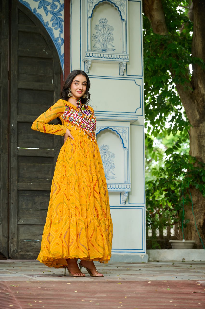 Yellow Bandhani Print Faux Georgette Gown with Kutchi Patchwork – Full Sleeves, 9 Meter Flair, Cotton Lining
