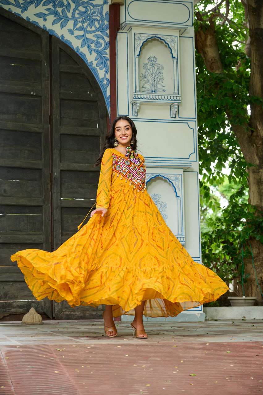 Yellow Bandhani Print Faux Georgette Gown with Kutchi Patchwork – Full Sleeves, 9 Meter Flair, Cotton Lining