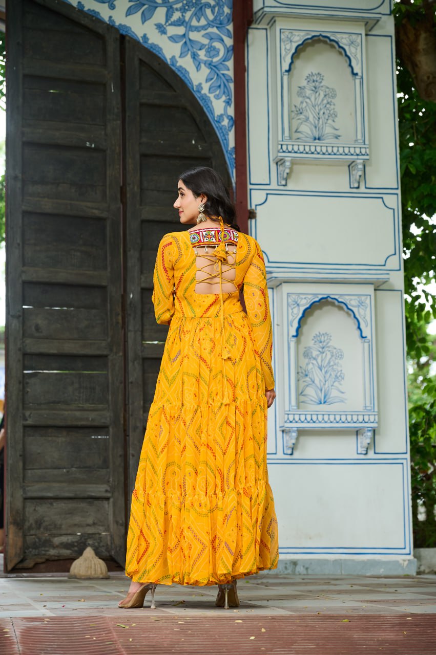 Yellow Bandhani Print Faux Georgette Gown with Kutchi Patchwork – Full Sleeves, 9 Meter Flair, Cotton Lining