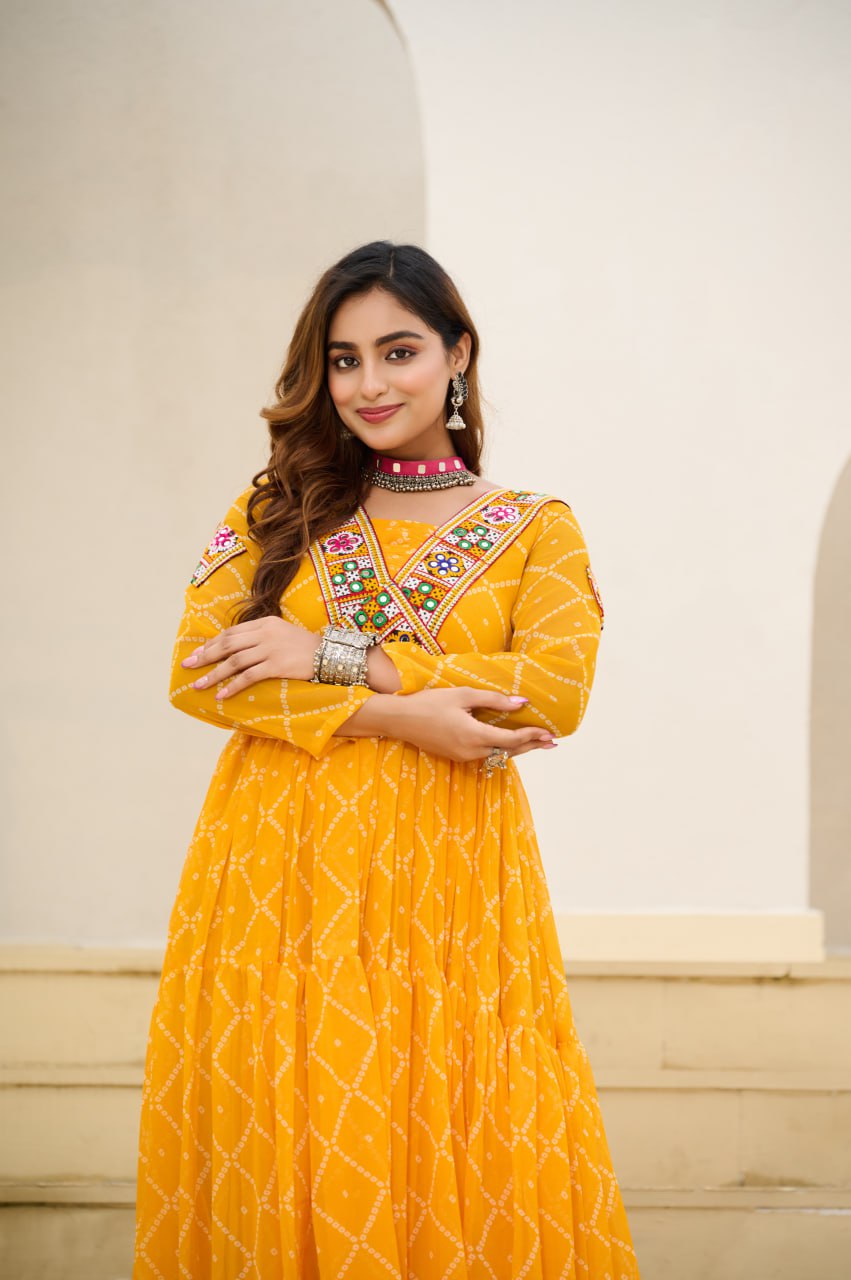 Yellow Bandhani Print Faux Georgette Gown with Kutchi Patchwork