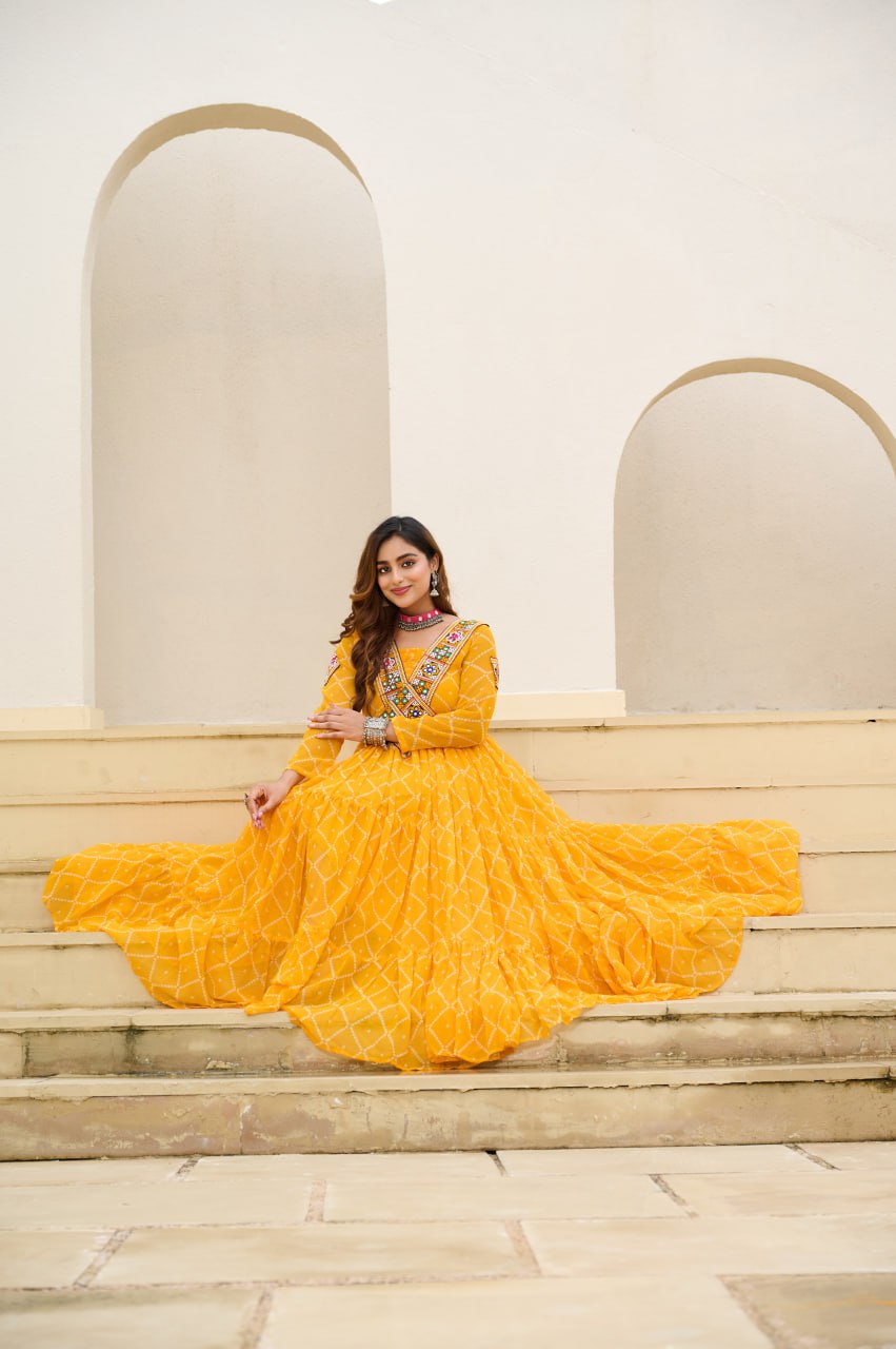 Yellow Bandhani Print Faux Georgette Gown with Kutchi Patchwork