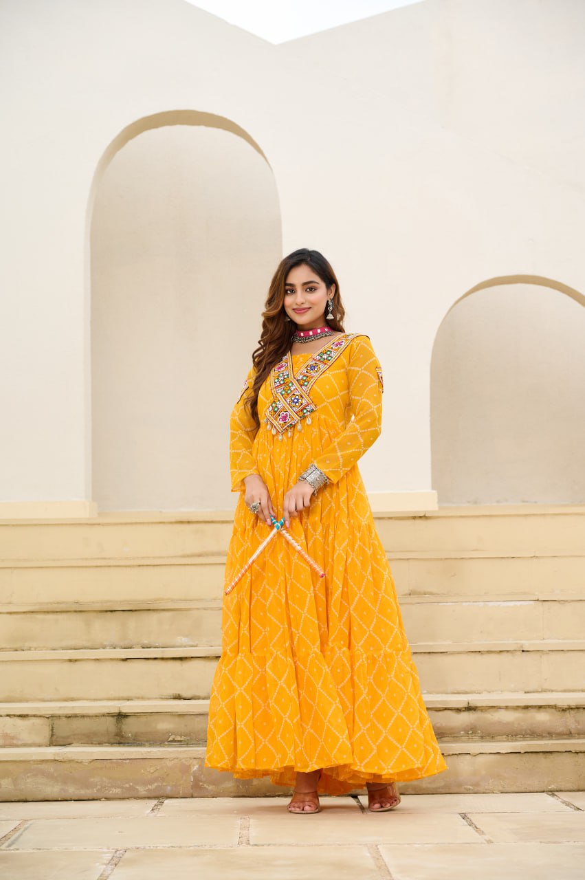 Yellow Bandhani Print Faux Georgette Gown with Kutchi Patchwork