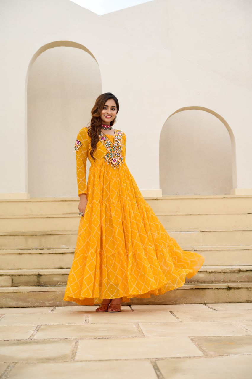 Yellow Bandhani Print Faux Georgette Gown with Kutchi Patchwork