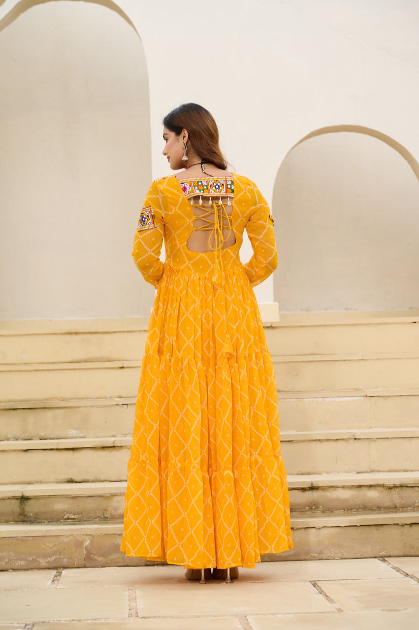 Yellow Bandhani Print Faux Georgette Gown with Kutchi Patchwork