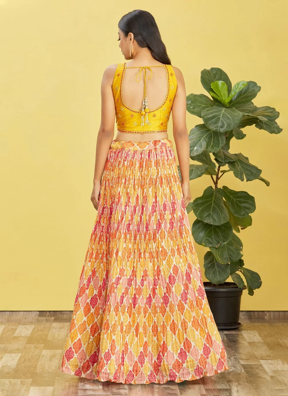 Yellow chinnon mirror sequins and printed work party wear lehenga