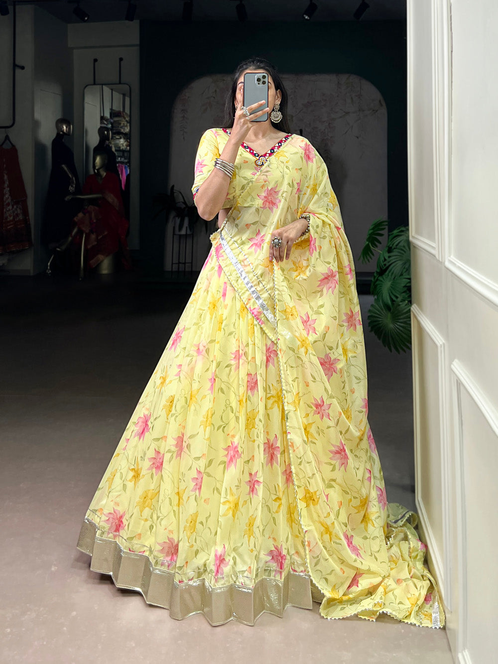 Yellow tubby silk floral printed lehenga choli with mirror work embossed lace detailing