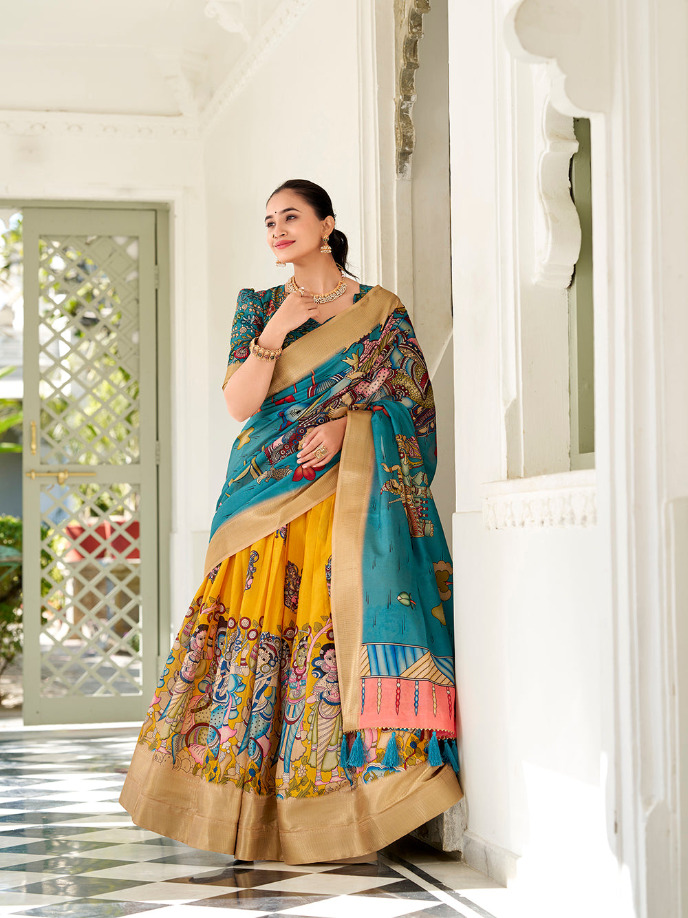 Yellow dola silk kalamkari print lehenga with firozi dupatta unstitched blouse