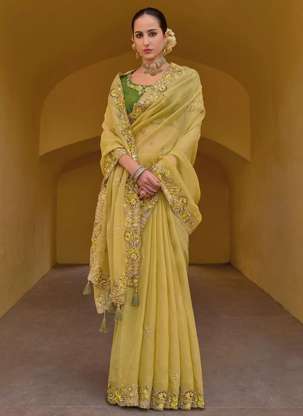 Gorgeous yellow fancy tissue organza silk saree with embroidery stone work