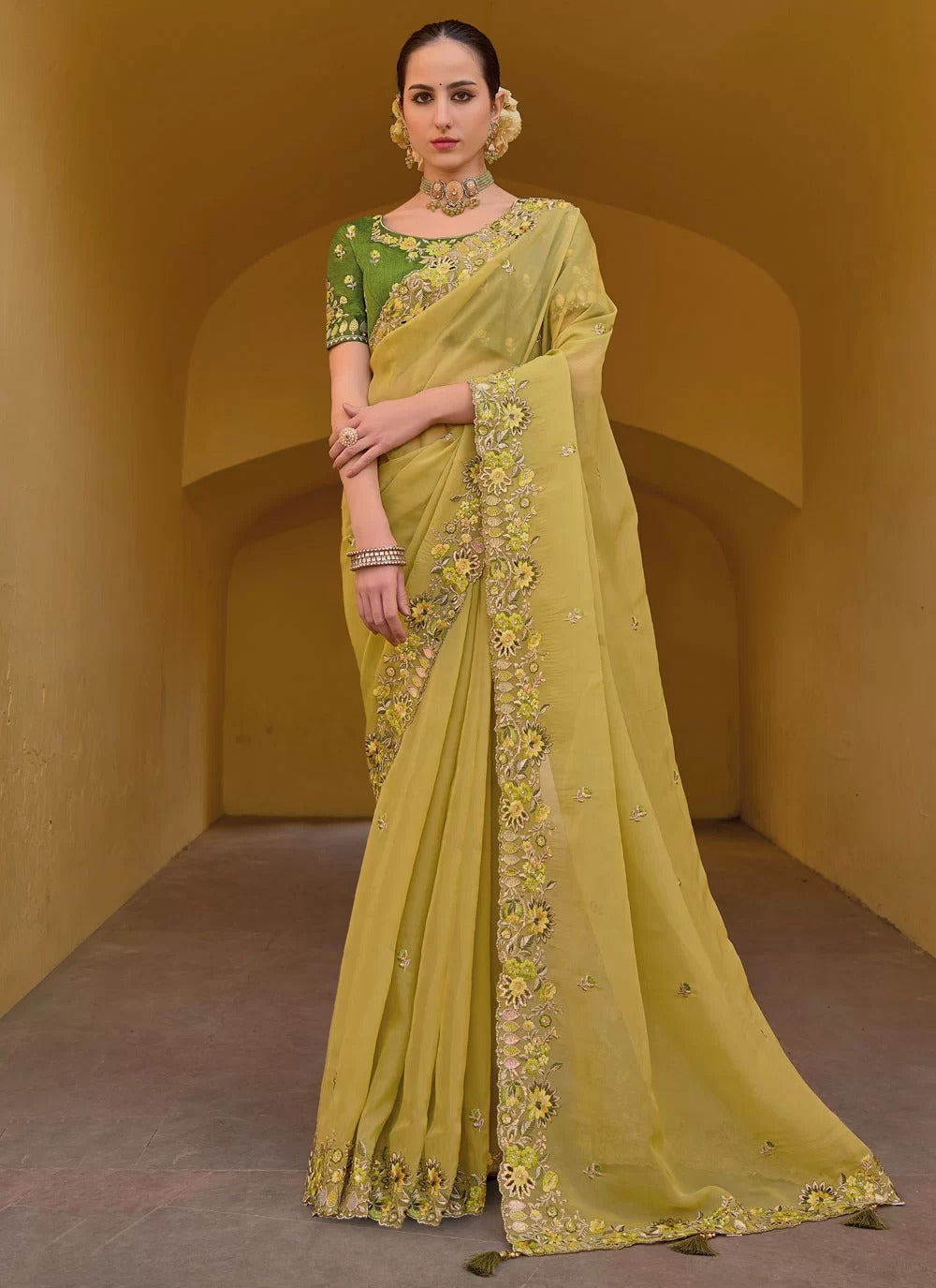 Gorgeous yellow fancy tissue organza silk saree with embroidery stone work