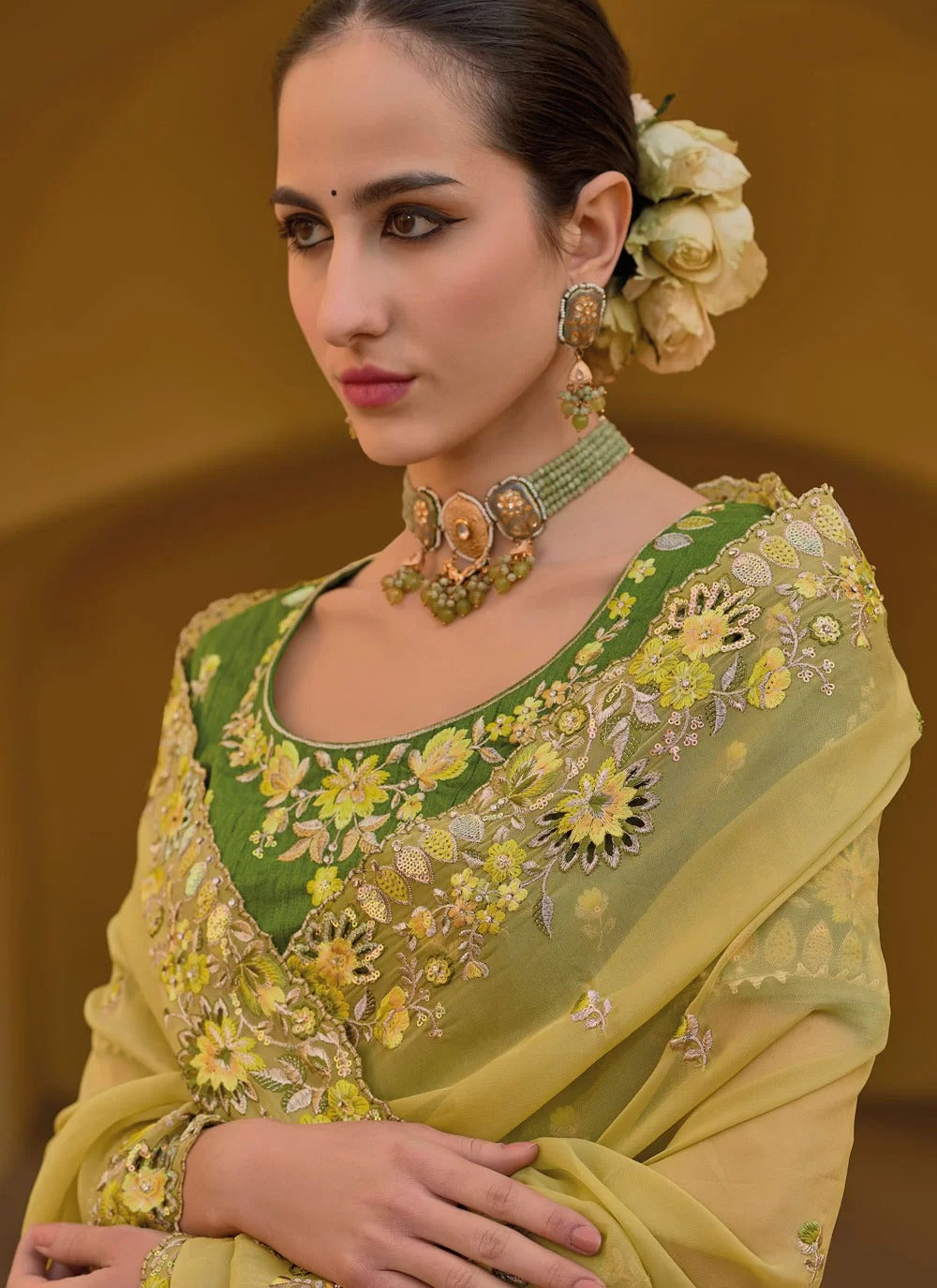 Gorgeous yellow fancy tissue organza silk saree with embroidery stone work