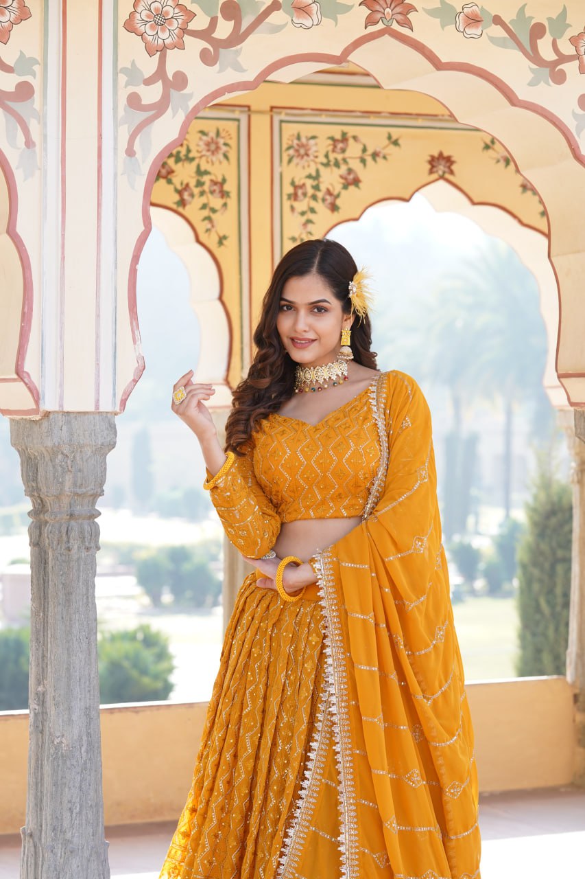 Shimmering Yellow Faux Georgette Lehenga Choli with Sequins & Thread Work