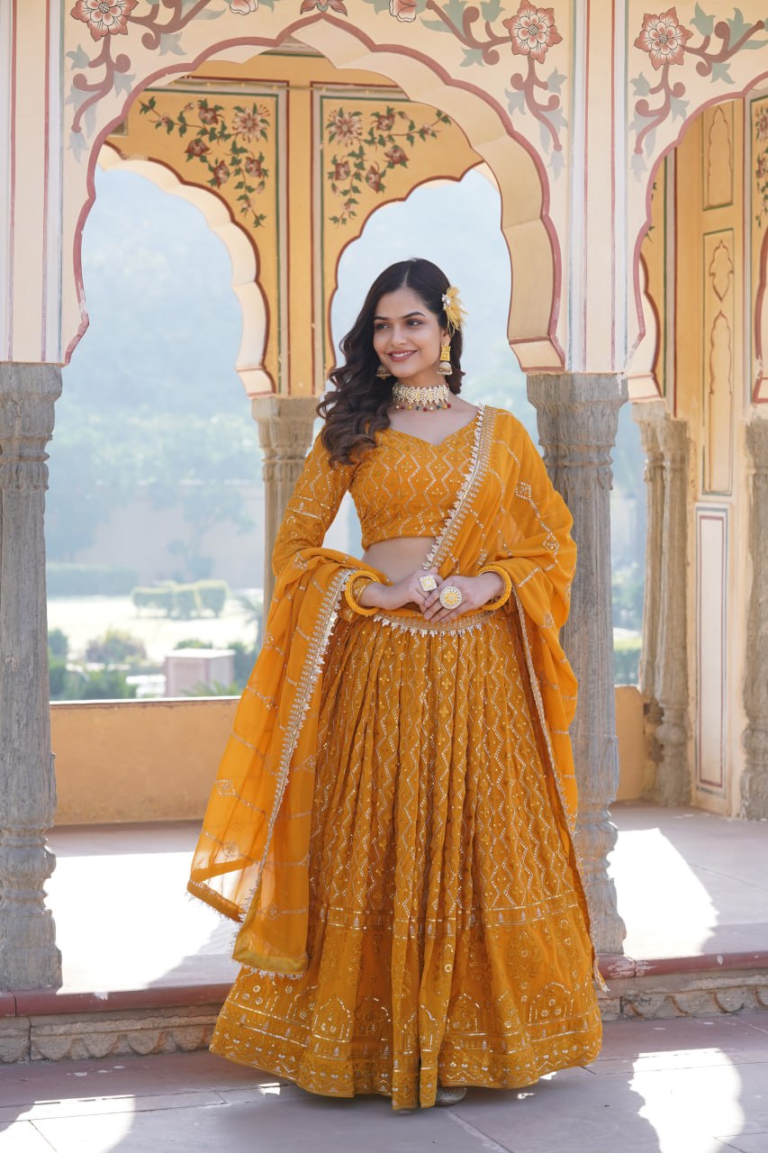 Shimmering Yellow Faux Georgette Lehenga Choli with Sequins & Thread Work
