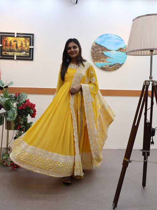 Yellow Fox Georgette Sequin Embroidered Gown with Flowing Skirt and Matching Dupatta