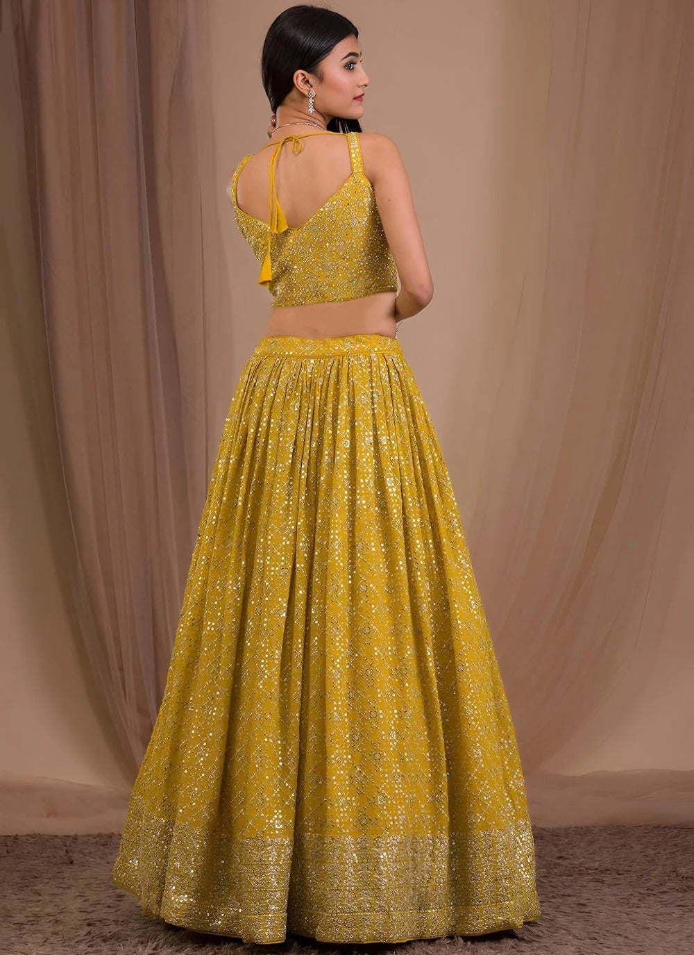 Yellow haldi ceremony lehenga in georgette with zari sequins embroidery
