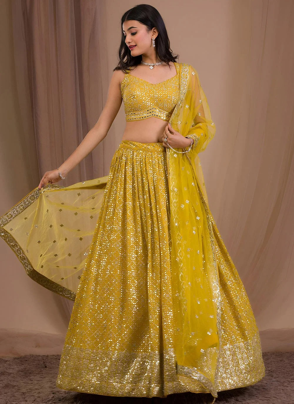 Yellow haldi ceremony lehenga in georgette with zari sequins embroidery