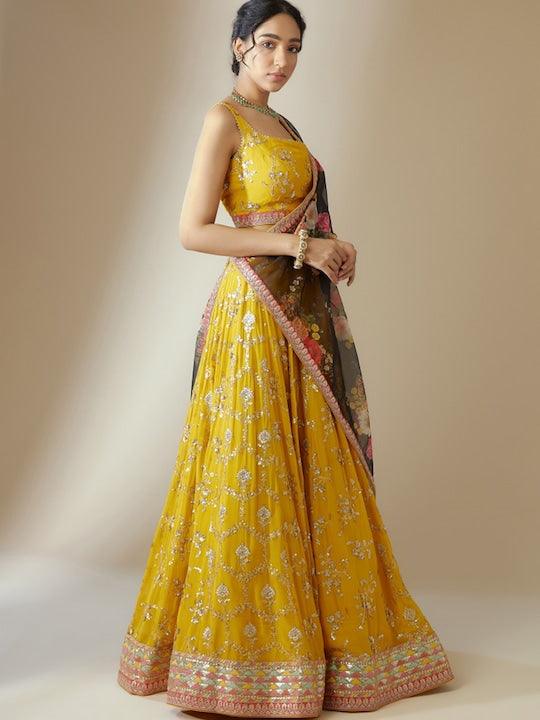 Yellow lehenga choli with contrast dupatta