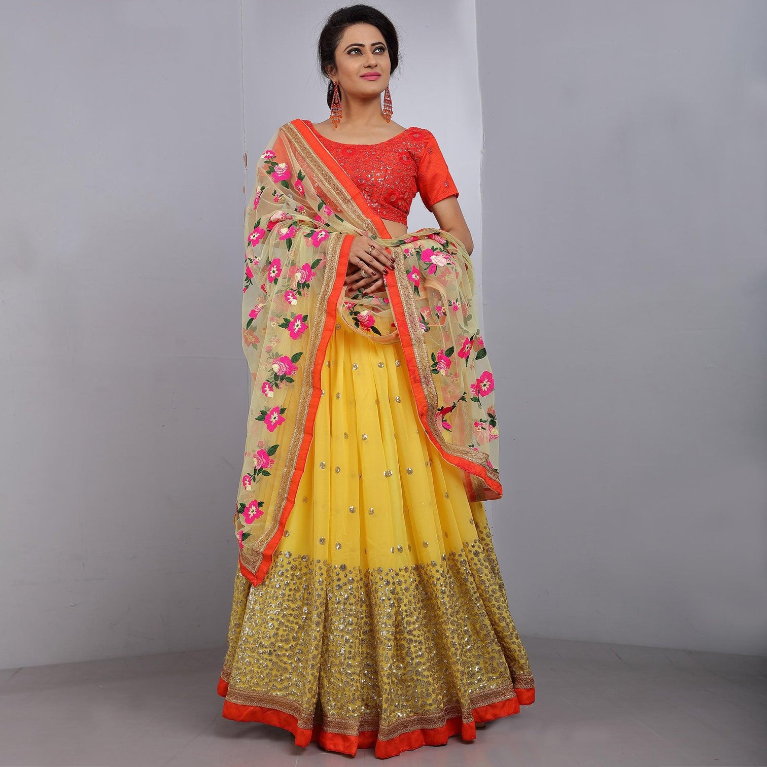 Yellow Party Wear Sequins Embroidered Georgette Lehenga Choli