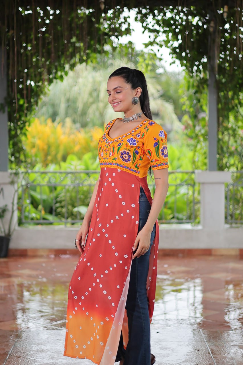 Yellow & Peach shade Navratri Special Printed Rayon Kurti with Kutchi Gamthi Embroidery & Pan Neck