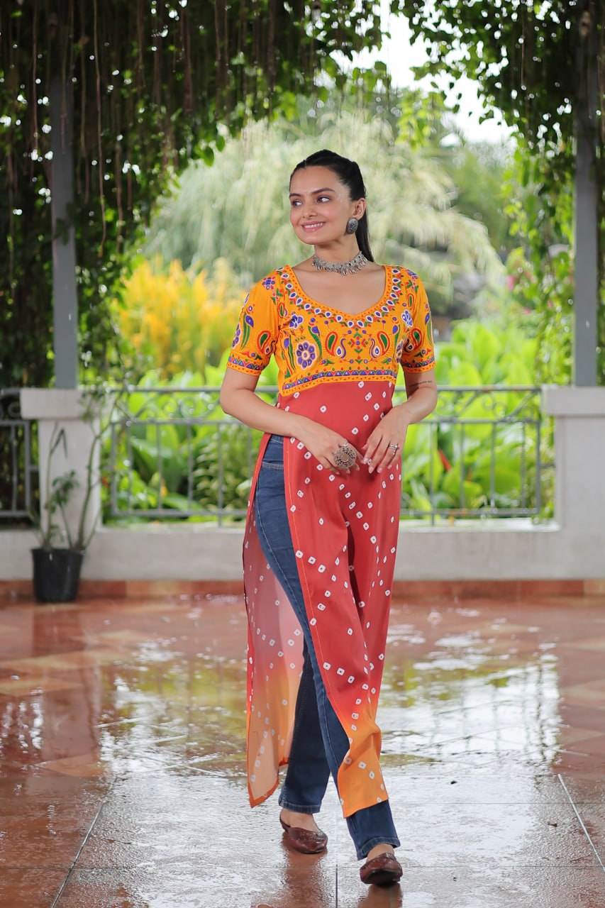 Yellow & Peach shade Navratri Special Printed Rayon Kurti with Kutchi Gamthi Embroidery & Pan Neck