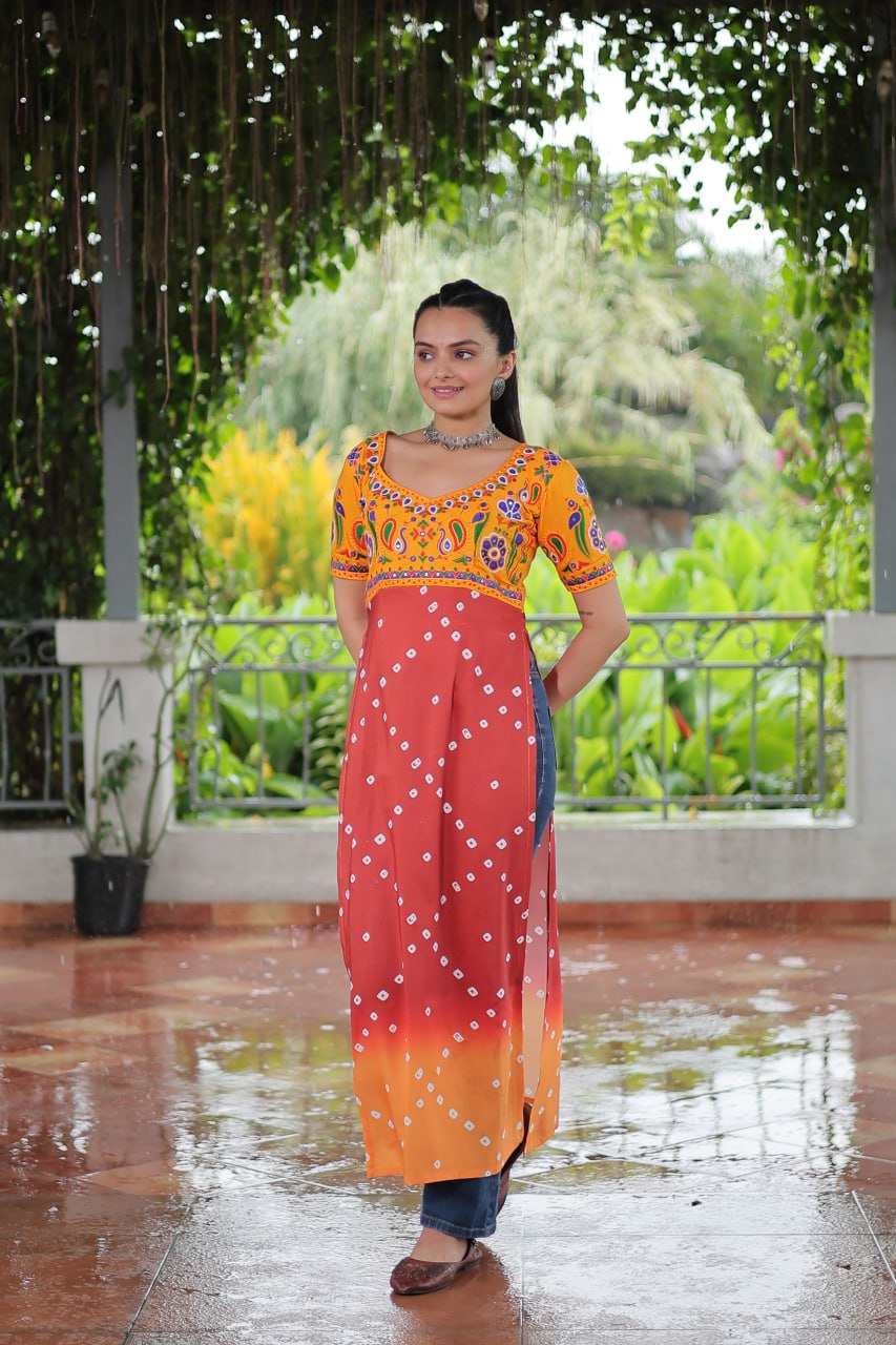 Yellow & Peach shade Navratri Special Printed Rayon Kurti with Kutchi Gamthi Embroidery & Pan Neck