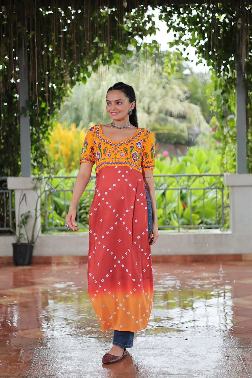Yellow & Peach shade Navratri Special Printed Rayon Kurti with Kutchi Gamthi Embroidery & Pan Neck