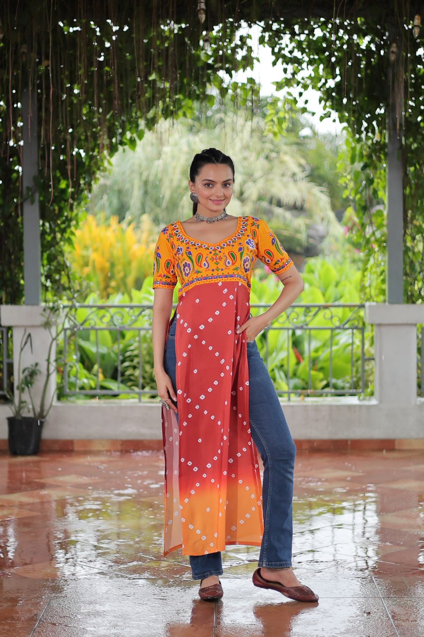 Yellow & Peach shade Navratri Special Printed Rayon Kurti with Kutchi Gamthi Embroidery & Pan Neck