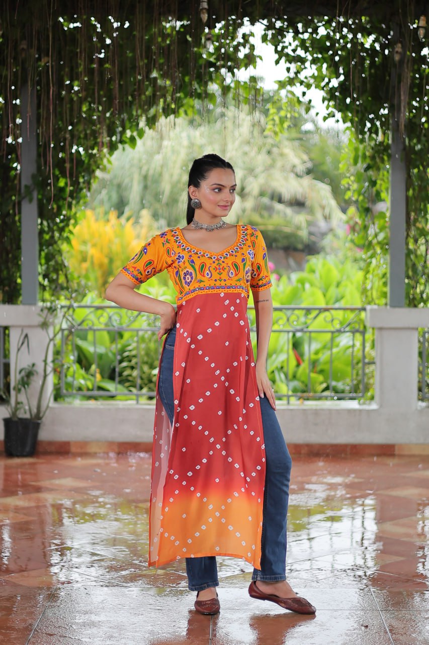 Yellow & Peach shade Navratri Special Printed Rayon Kurti with Kutchi Gamthi Embroidery & Pan Neck