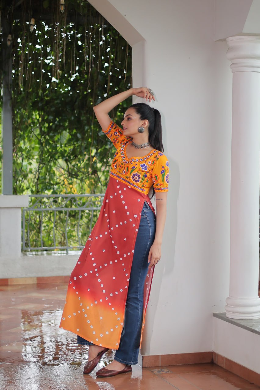 Yellow & Peach shade Navratri Special Printed Rayon Kurti with Kutchi Gamthi Embroidery & Pan Neck