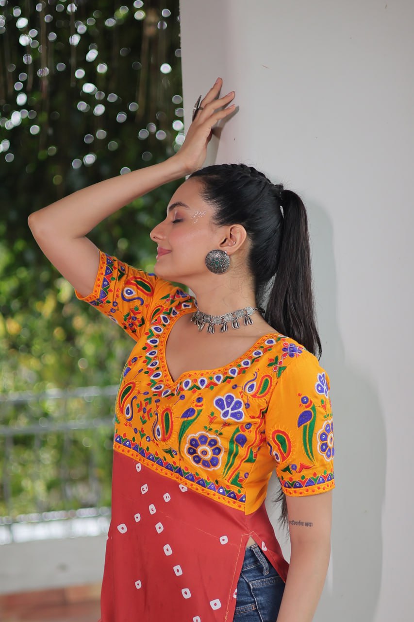 Yellow & Peach shade Navratri Special Printed Rayon Kurti with Kutchi Gamthi Embroidery & Pan Neck