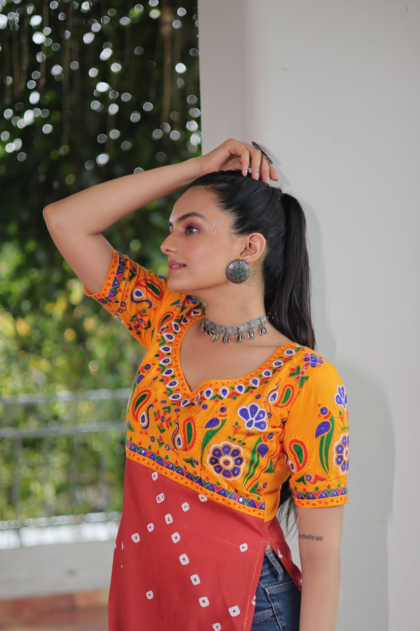 Yellow & Peach shade Navratri Special Printed Rayon Kurti with Kutchi Gamthi Embroidery & Pan Neck