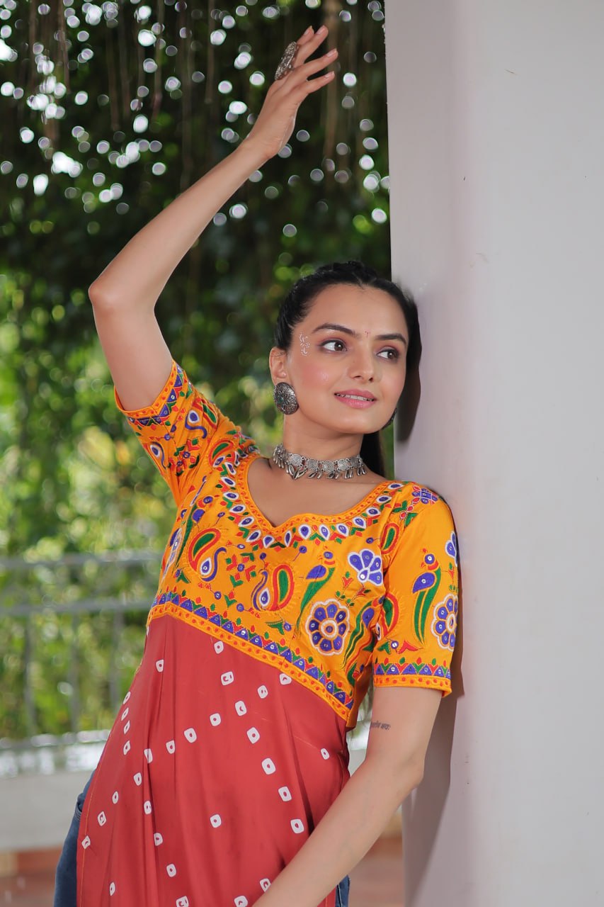 Yellow & Peach shade Navratri Special Printed Rayon Kurti with Kutchi Gamthi Embroidery & Pan Neck