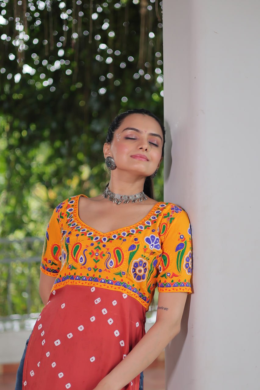 Yellow & Peach shade Navratri Special Printed Rayon Kurti with Kutchi Gamthi Embroidery & Pan Neck