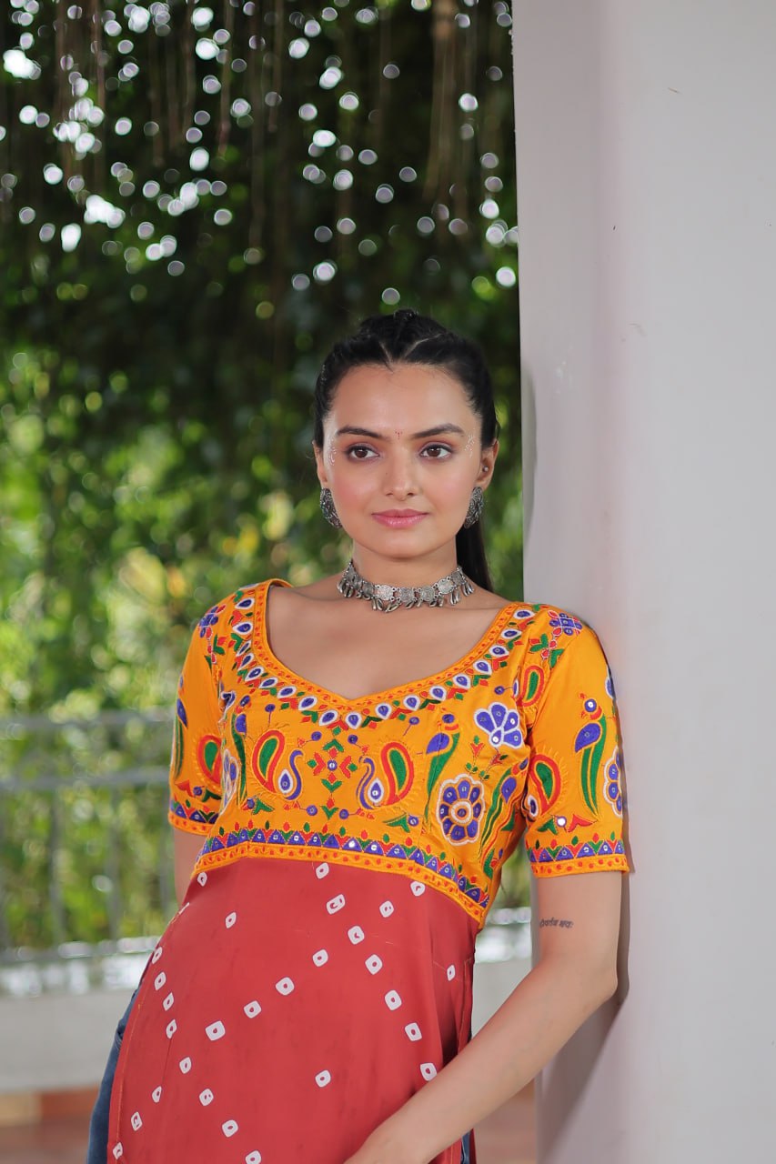 Yellow & Peach shade Navratri Special Printed Rayon Kurti with Kutchi Gamthi Embroidery & Pan Neck