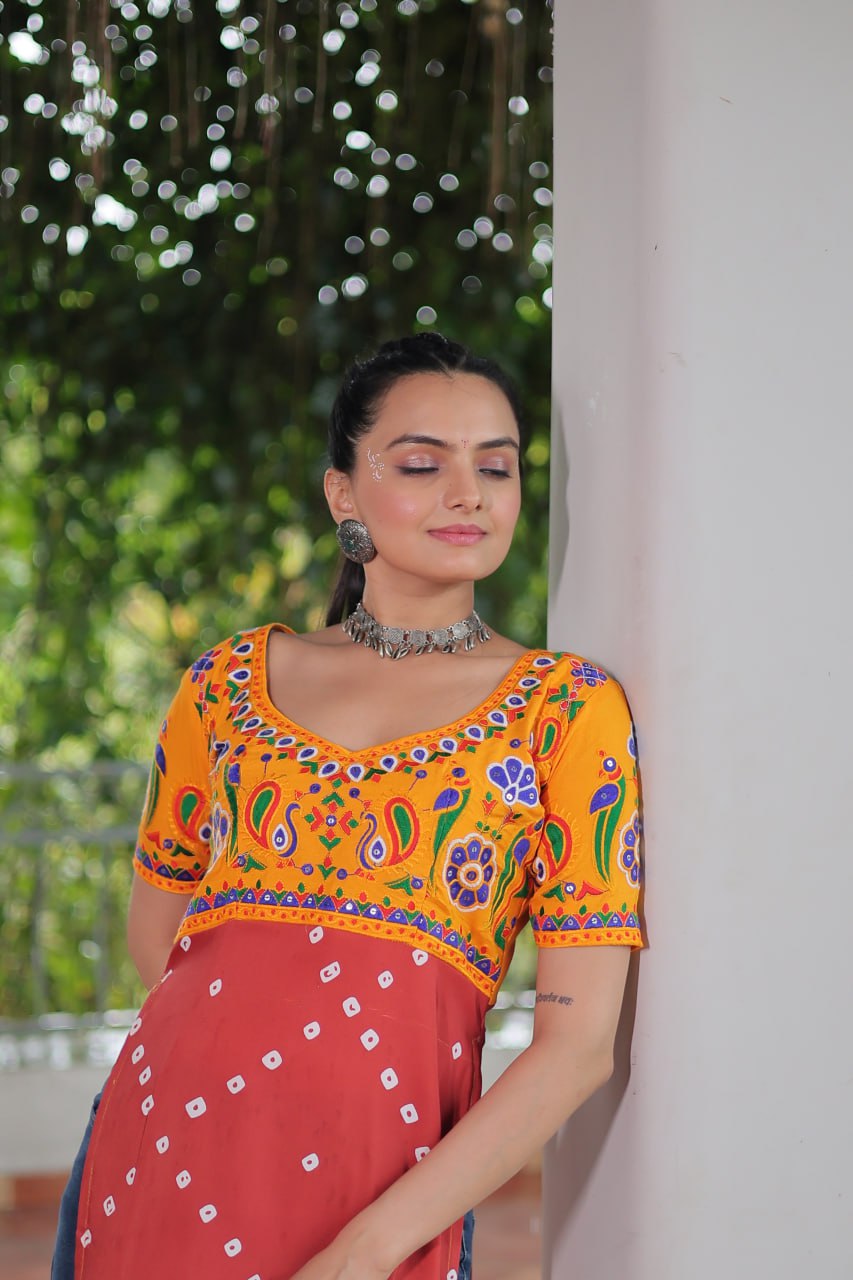 Yellow & Peach shade Navratri Special Printed Rayon Kurti with Kutchi Gamthi Embroidery & Pan Neck