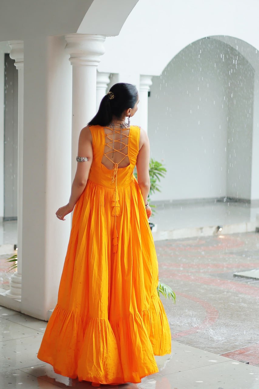 Yellow Rayon Navratri Gown with Kutchi Gamthi Embroidery & Mirror Work – Sleeveless with Flair