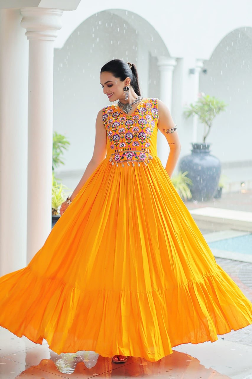 Yellow Rayon Navratri Gown with Kutchi Gamthi Embroidery & Mirror Work – Sleeveless with Flair