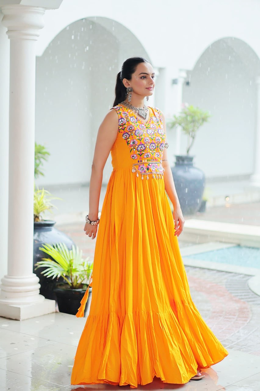 Yellow Rayon Navratri Gown with Kutchi Gamthi Embroidery & Mirror Work – Sleeveless with Flair