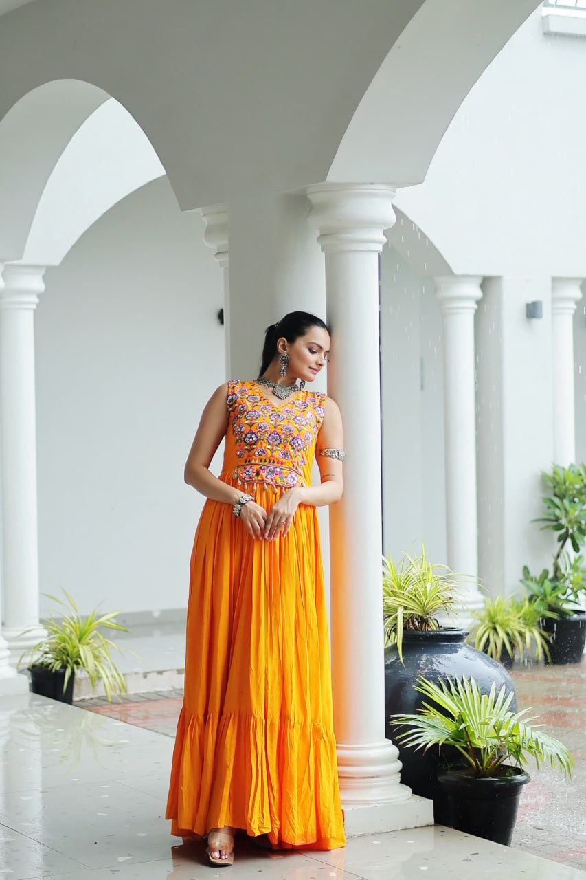 Yellow Rayon Navratri Gown with Kutchi Gamthi Embroidery & Mirror Work – Sleeveless with Flair