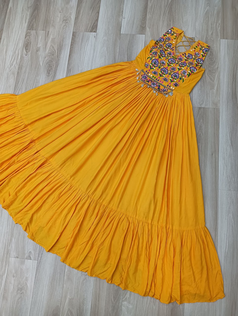 Yellow Rayon Navratri Gown with Kutchi Gamthi Embroidery & Mirror Work – Sleeveless with Flair