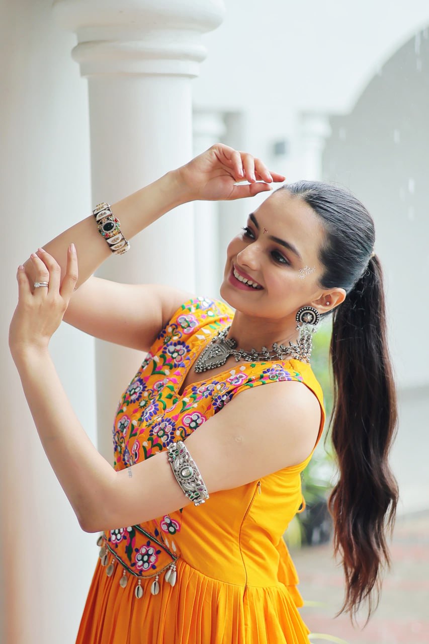 Yellow Rayon Navratri Gown with Kutchi Gamthi Embroidery & Mirror Work – Sleeveless with Flair